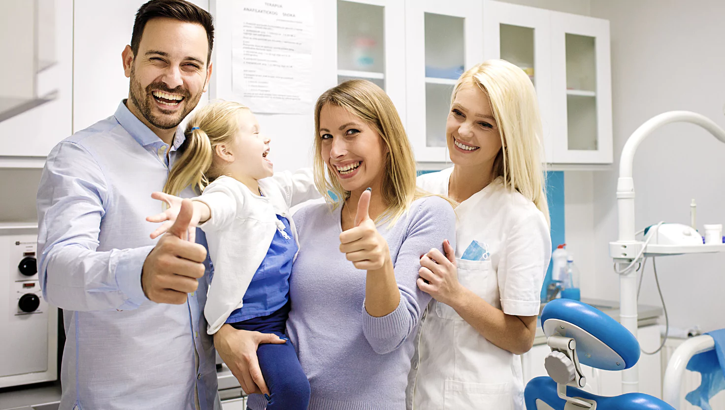 A happy family at a dental visit, emphasizing stress-free checkups